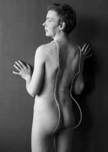 Behind